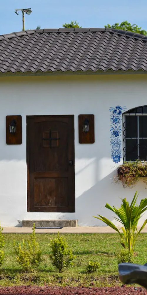 Street view with Metro Bus in San Luis Talpa, SV