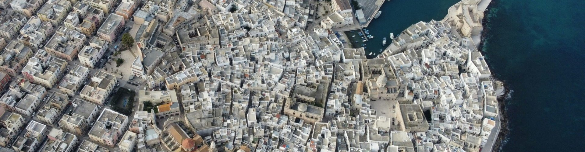 Evening riverside shot of Monopoli, IT