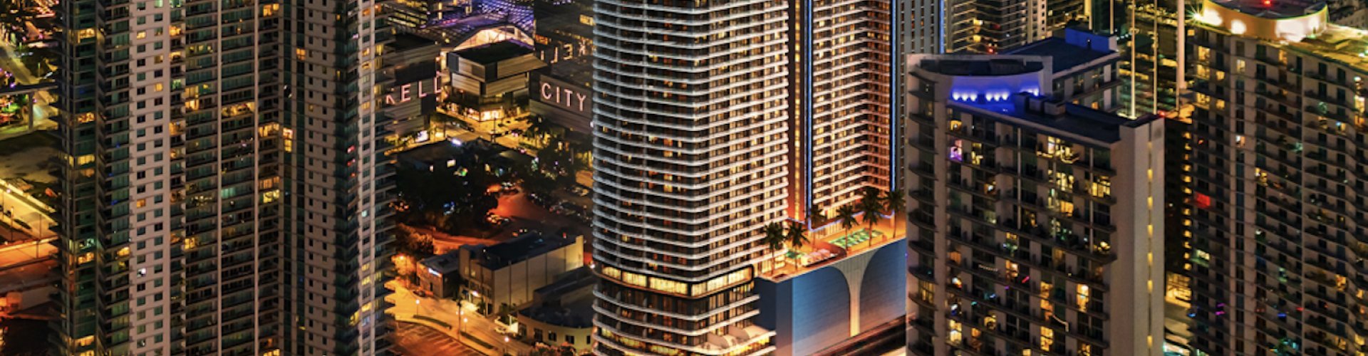 Evening riverside shot of Miami skyline