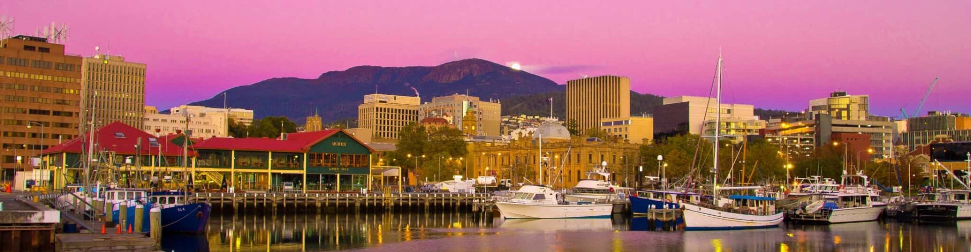 Evening riverside view of Hobart, TA, AU