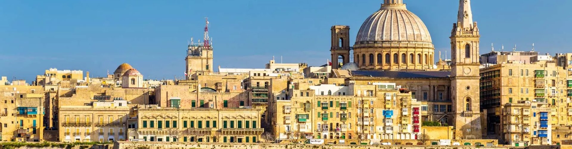 Evening riverside shot of Valletta, MT