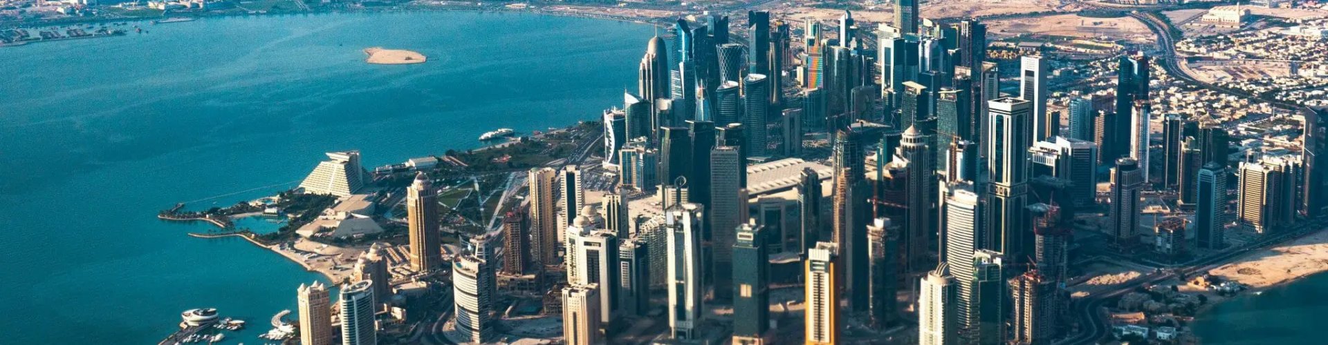 Evening riverside shot of Doha, QA