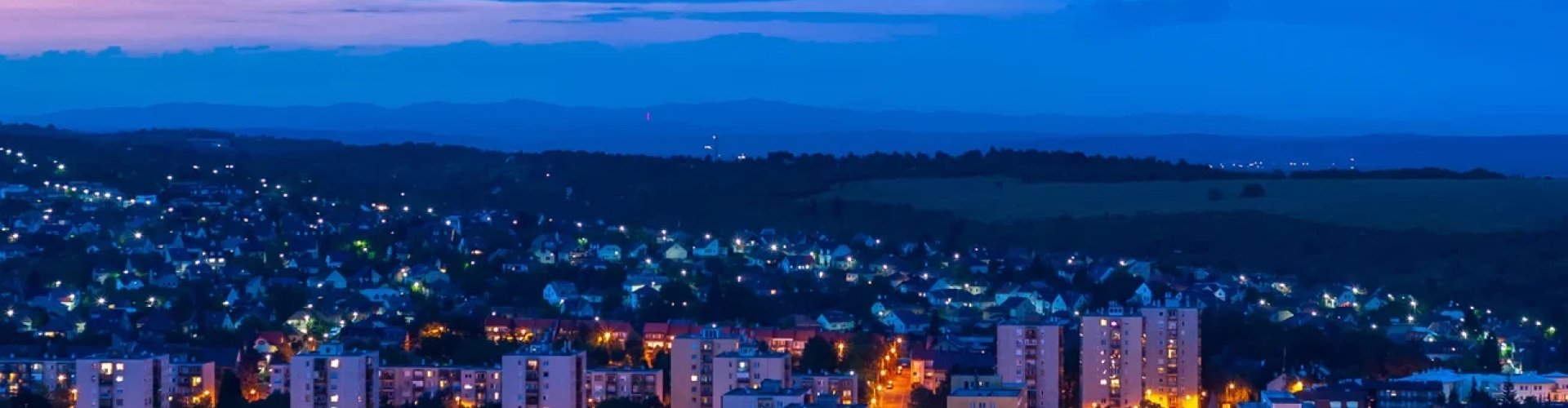 Evening riverside shot of Miskolc, HU